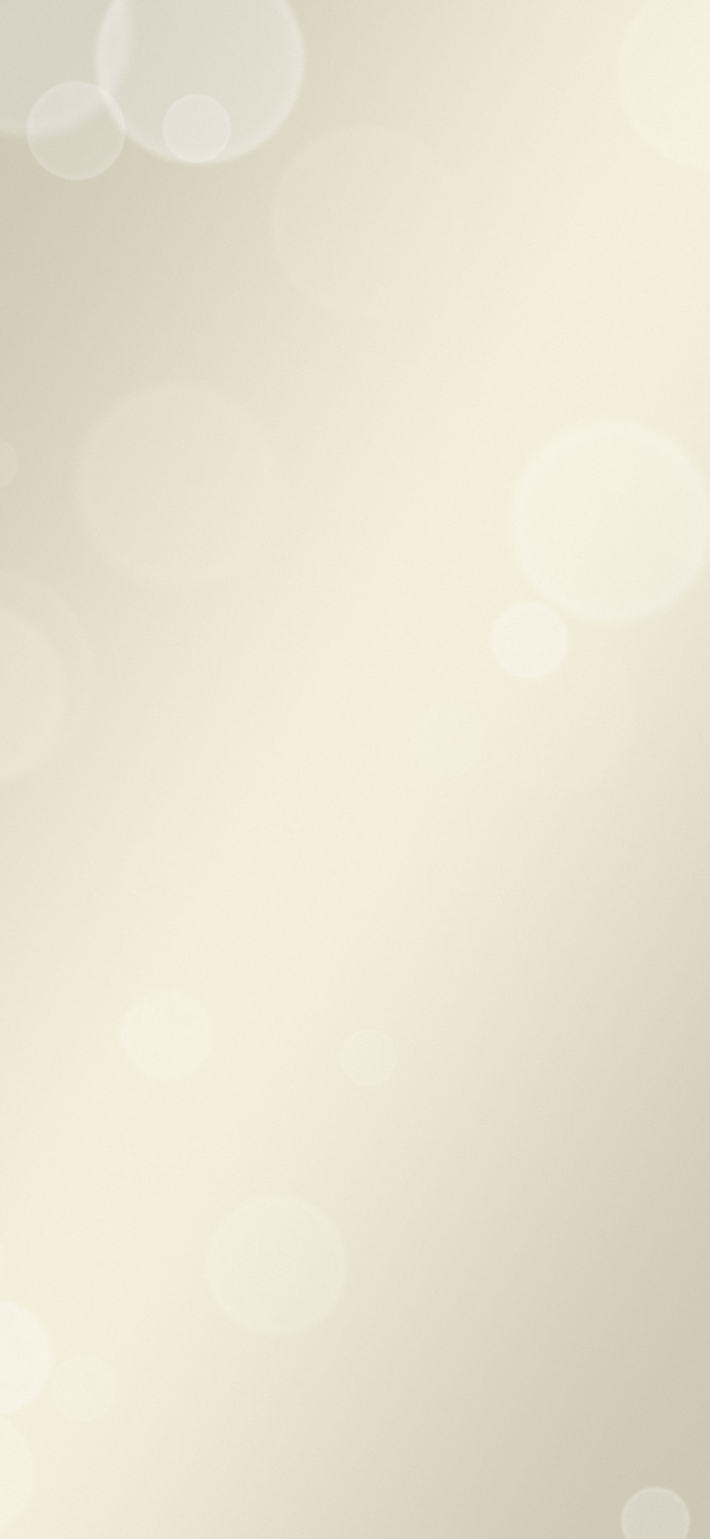 Cream and Beige Bokeh Lights wallpaper for iPhone and Android